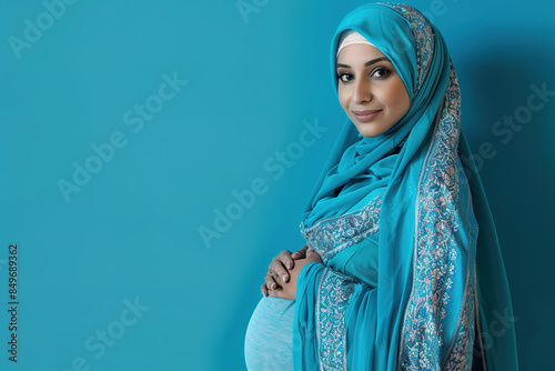 Pregnant Arab Middle Eastern Woman Isolated blue Background Model Maternity Portrait, beautiful, hijab