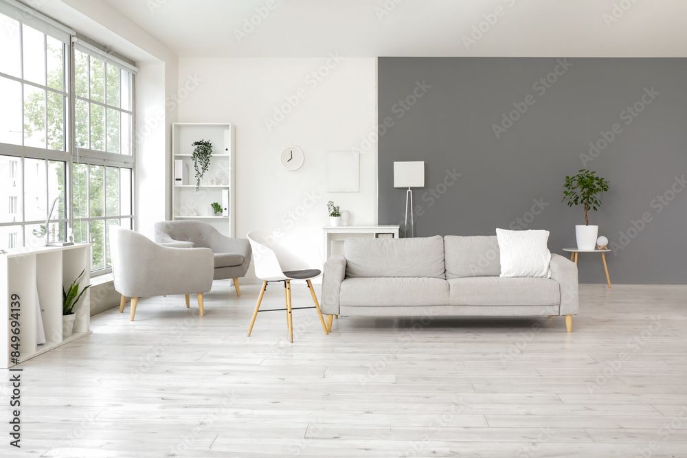 Interior of psychologist's office with sofa and armchairs