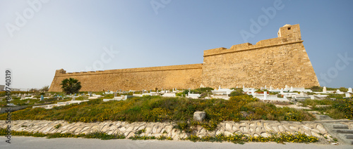 External view of stone walls of Mahdia fort built in the 16th century, Tunisia photo