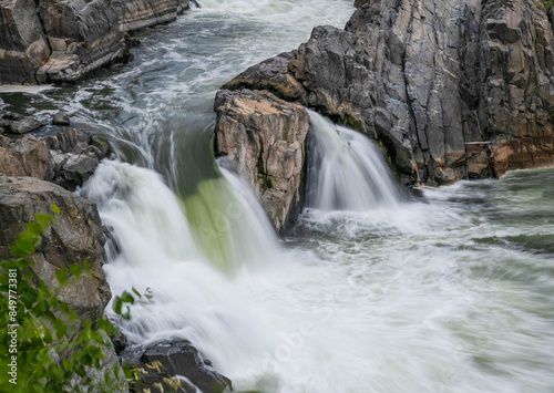 Great Falls in Virginia is a place of rapid waters and powerful waterfalls, surrounded by the serene beauty of nature. The river flows through the landscape, offering a perfect setting for travel phot