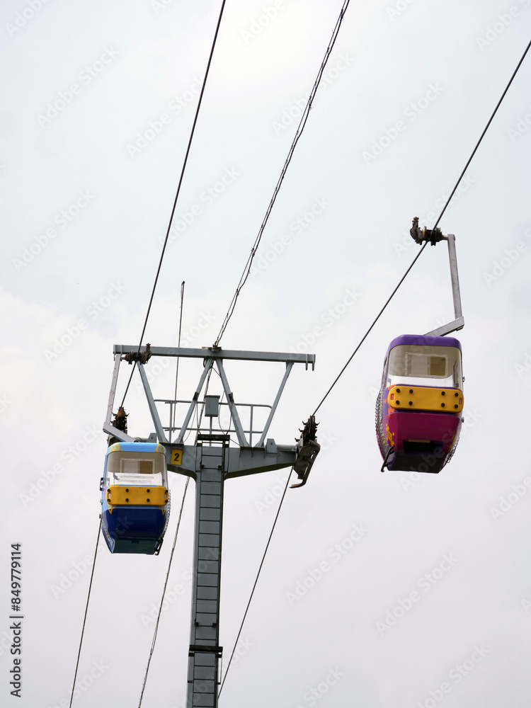 cable car with blue sky background. Cable car in Taman Mini Indonesia Indah cable car with blue sky background. Cable car in Taman Mini Indonesia Indah