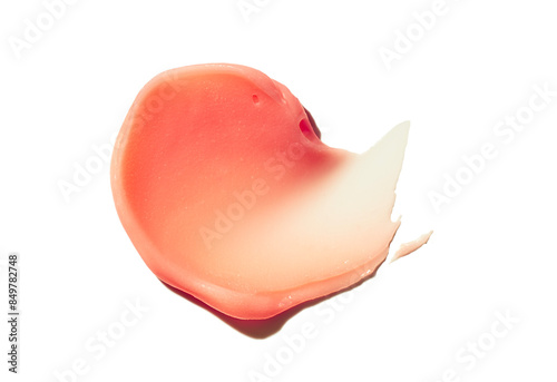 Cosmetic products creamy orangetexture of lip balm smudge white isolated background