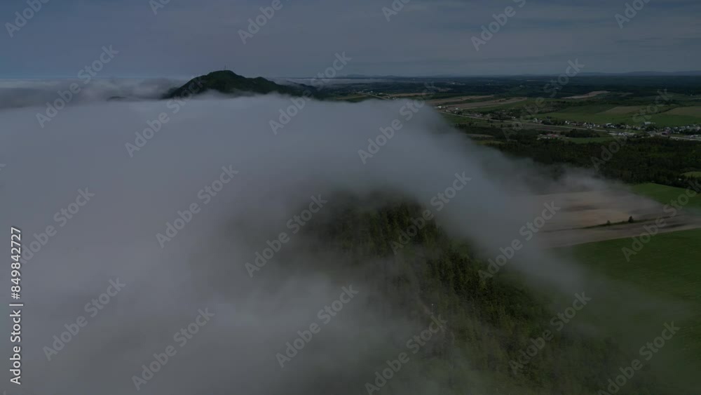 Mountain view with low flowing cloud river Mountain view with low flowing cloud river