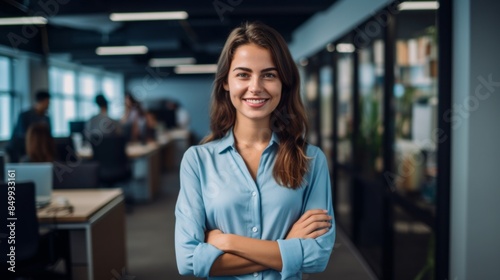 Smiling beautiful female professional manager standing with arms crossed looking at camera, happy confident business woman corporate leader boss ceo posing in office, headshot close up portrait