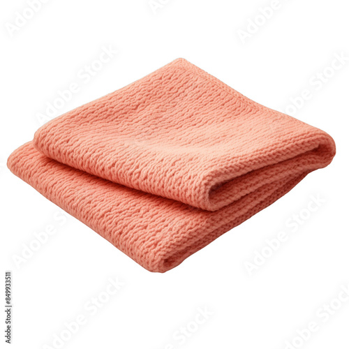 Soft, folded coral-colored knit blanket on white background, ideal for cozy home decor, bedding, or warmth during cold seasons.