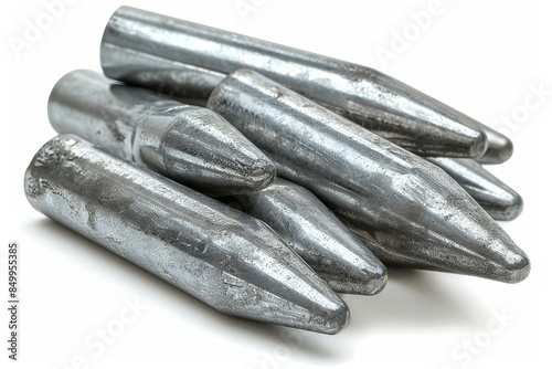 A set of tungsten fishing sinkers with a bullet shape, white background