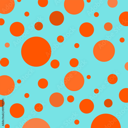 Orange dots  circles on a mint green background