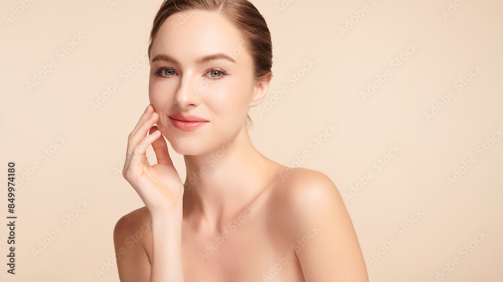 Beautiful young woman with clean fresh skin on beige background, Face care, Facial treatment, Cosmetology, beauty and spa, women portrait. Beautiful young woman with clean fresh skin on beige background, Face care, Facial treatment, Cosmetology, beauty and spa, women portrait.