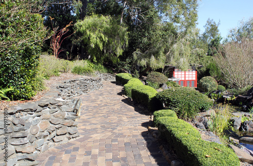 Pathway through plants and trees at the Bundaberg Botanic Gardens in Queensland, Australia