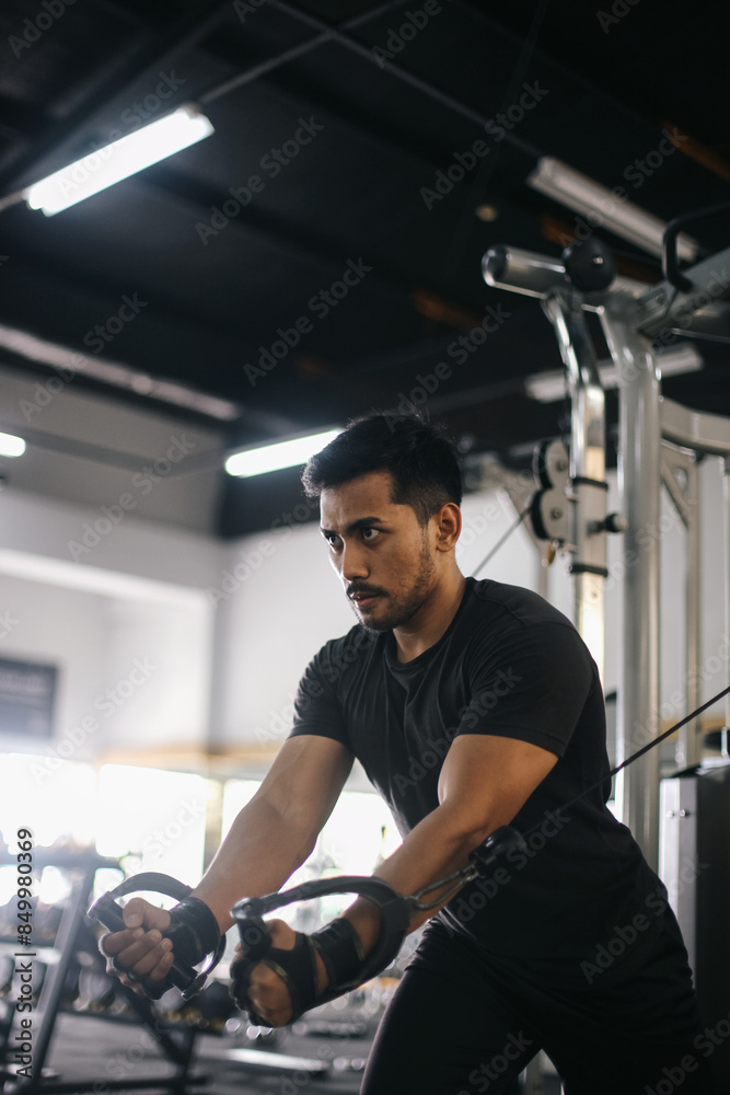 Young Asian Man Bodybuilder Doing Workout At Gym Young Asian Man Bodybuilder Doing Workout At Gym