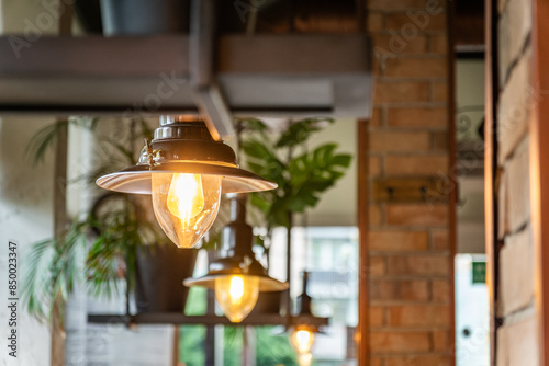 Glowing Light Bulbs rising price in electricity modern background