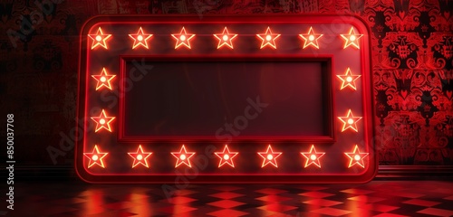 Red marquee frame with stars, neon bulbs illuminating on a patterned wall. © Arbaz