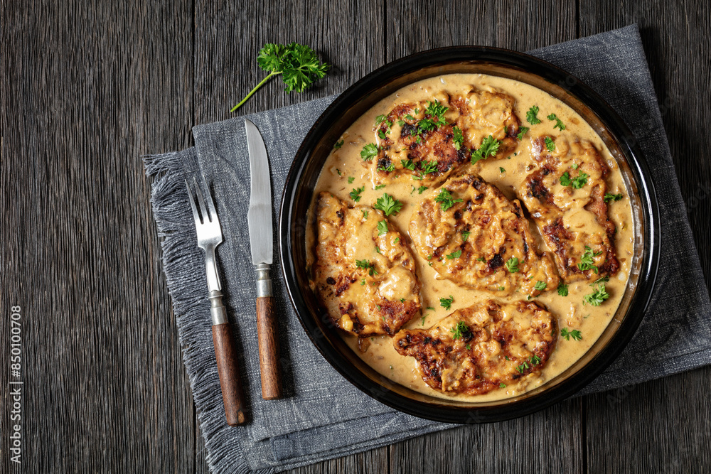 creamy smothered pork chops cooked in onion gravy creamy smothered pork chops cooked in onion gravy