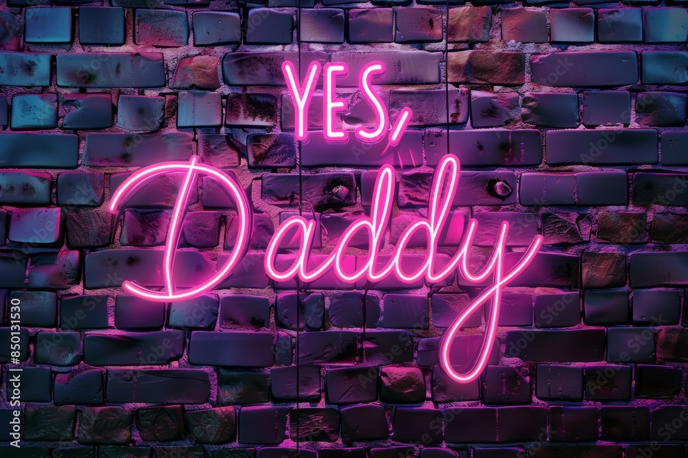 The text Yes, Daddy is written in neon sign in glowing pink color on a ...