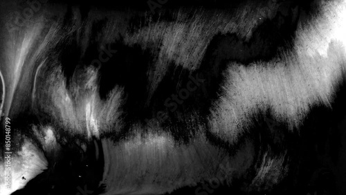 Beautiful white watercolor ink drops transition on black background, paint bleed Bloom, with circle organic flow expanding, pure splatter spreading. Perfect for motion graphics, digital composition	
 photo