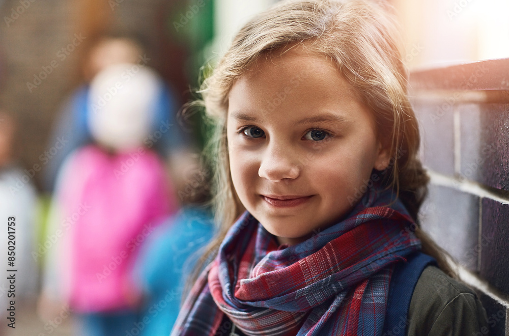 Elementary school, hallway and portrait of girl with smile for academy education, scholarship and child development. Happy, face and kid in corridor for learning, study and growth in knowledge Elementary school, hallway and portrait of girl with smile for academy education, scholarship and child development. Happy, face and kid in corridor for learning, study and growth in knowledge