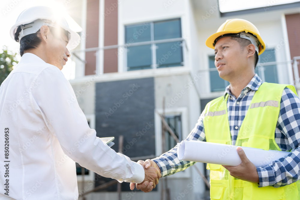 Construction team hands shaking greeting start up plan new project contract in office center at construction site, industry ,architecture, partner, teamwork, agreement, property, contacts. Construction team hands shaking greeting start up plan new project contract in office center at construction site, industry ,architecture, partner, teamwork, agreement, property, contacts.