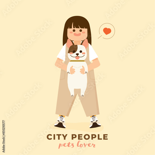 cute girl holding a lovely dog.