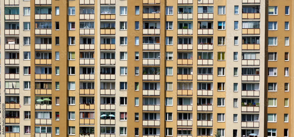 View of a block of flats with balconies; multi-apartment block; apartment building; thelarge panel system building View of a block of flats with balconies; multi-apartment block; apartment building; thelarge panel system building
