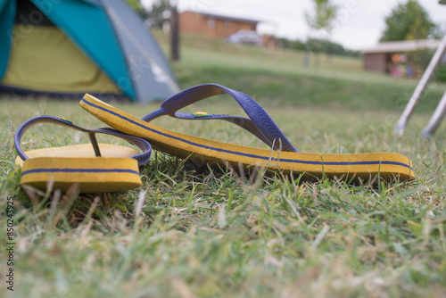 a pair of sandals on grass