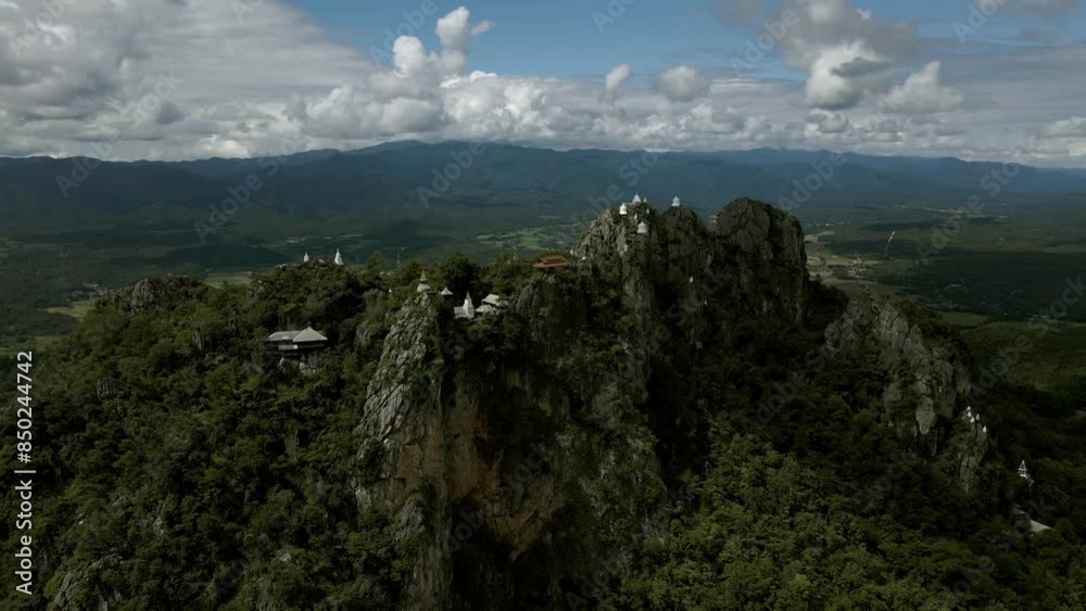 High angle view of the pagoda on the top of the rocky mountain. Chaloem Phrakiat Temple, Lampang Province, Thailand High angle view of the pagoda on the top of the rocky mountain. Chaloem Phrakiat Temple, Lampang Province, Thailand