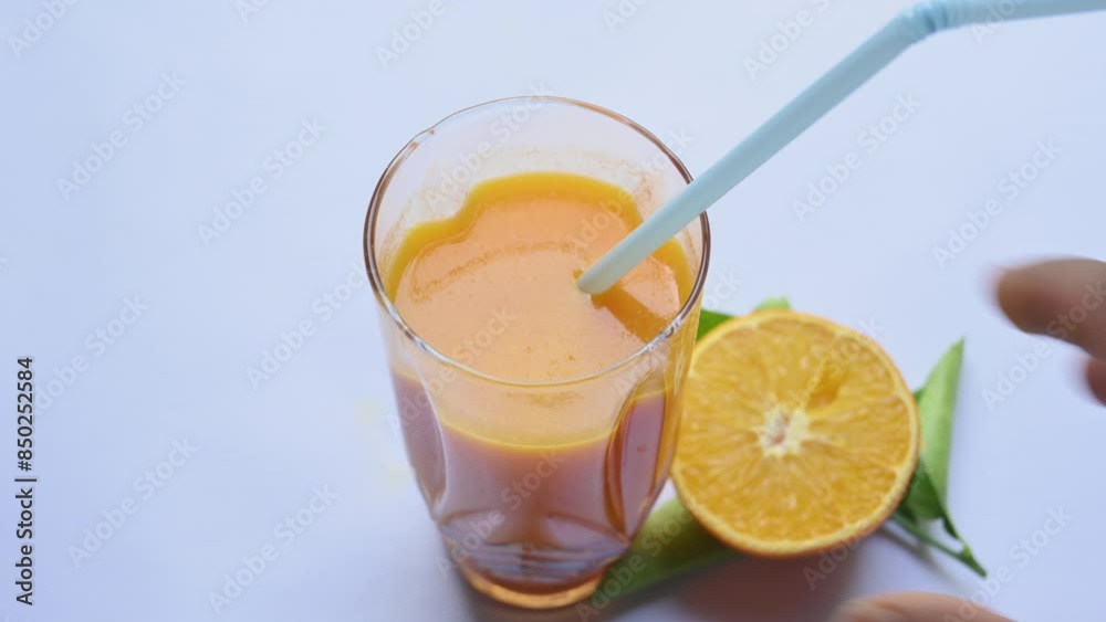 Fresh Orange juice on white background. It is a famous fruit juice which contains lots of vitamins like vitamin C, folate and potassium. Healthy drink. Fruit juice.
Fresh Orange juice on white background. It is a famous fruit juice which contains lots of vitamins like vitamin C, folate and potassium. Healthy drink. Fruit juice.