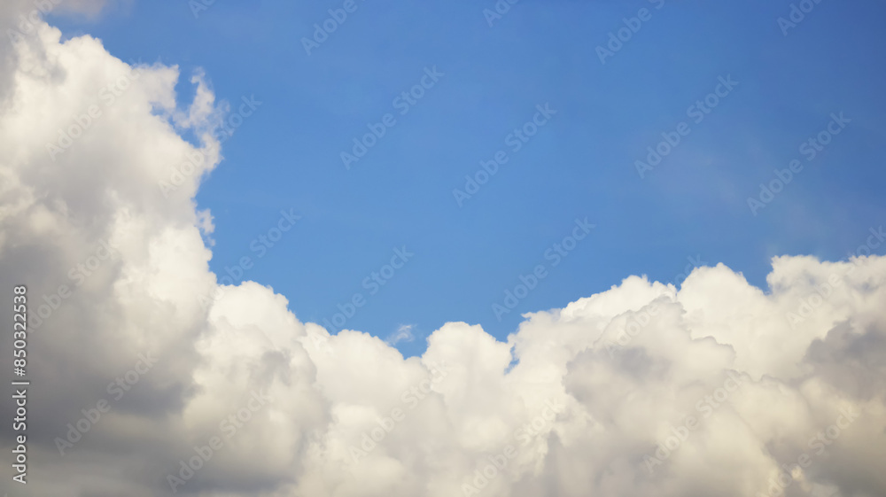 Aerial view of massive clouds and beautiful summer blue sky from aircraft window.Image use for environment and meteorology presentation background. Aerial view of massive clouds and beautiful summer blue sky from aircraft window.Image use for environment and meteorology presentation background.