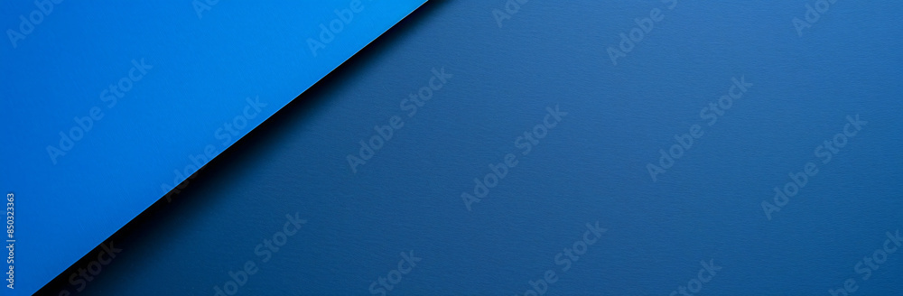 Minimalist blue background with a geometric shape resembling a piece of paper Minimalist blue background with a geometric shape resembling a piece of paper