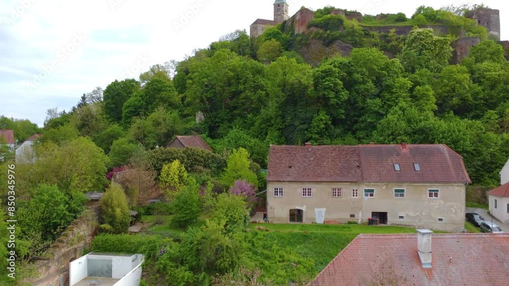 Güssing Castle on Hilltop in Burgenland, Austria. Aerial approaching view of a fortress. Güssing Castle on Hilltop in Burgenland, Austria. Aerial approaching view of a fortress.