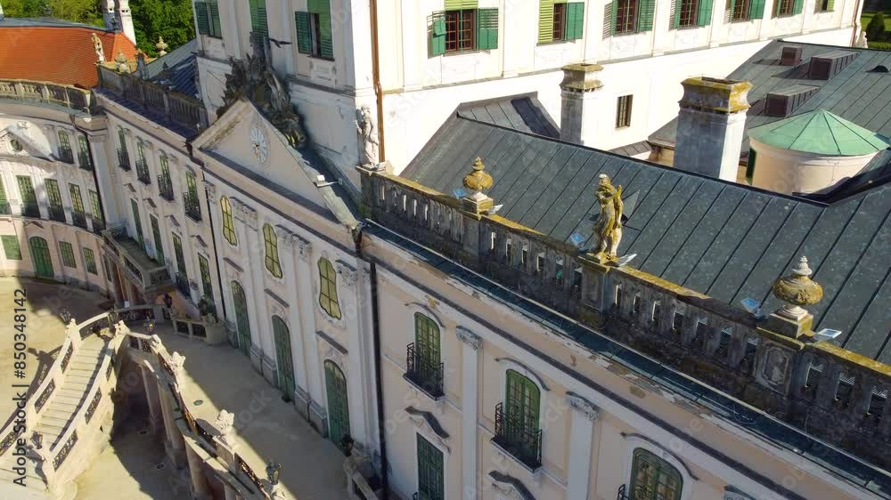 Famous Esterhazy Castle, Fertod, Hungary exterior view, Palace design and clock.