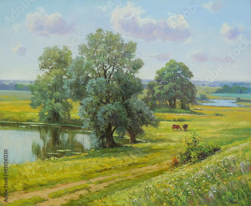 Summer meadows with trees by the river
