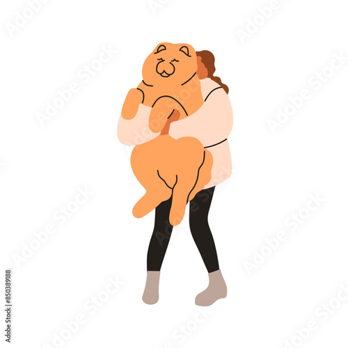 Woman holding big furry dog. Pet owner, girl carrying cute giant doggy. Femal...