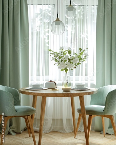 Scandinavian modern dining room: Two mint chairs around a round wooden table by a window adorned with light green and white curtains