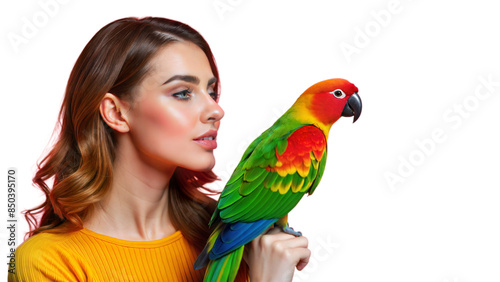 An exotic portrait of a young woman with a colorful parrot, illustrating the vibrant and playful nature of their connection. photo