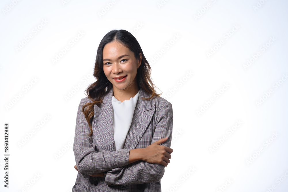 Portrait of confident businesswoman standing with crossed arms isolated over white background Portrait of confident businesswoman standing with crossed arms isolated over white background