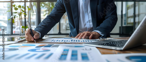 Professional Financial Analyst Analyzing Graphs on PC desk prospective without face, Ultrawide