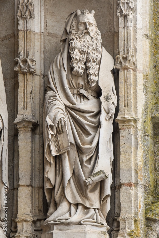 statue of moses at the entrance of the church of Auxonne in france