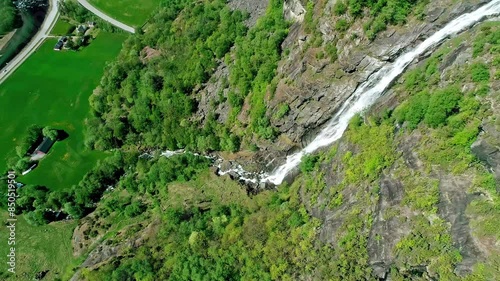 High waterfall at Gudvangen in Aurland, Norway. Drone video
 photo