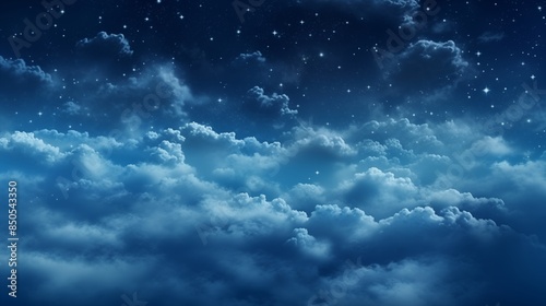 Fluffy volumetric clouds at night against a dark blue sky with stars background. photo