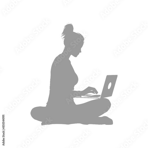 silhouette elderly woman playing on laptop while sitting cross legged