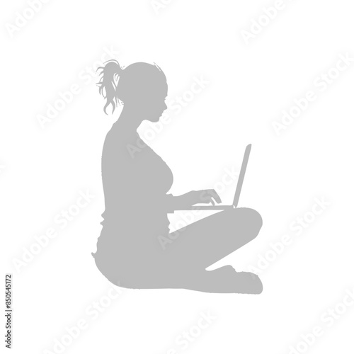 silhouette elderly woman playing on laptop while sitting cross legged