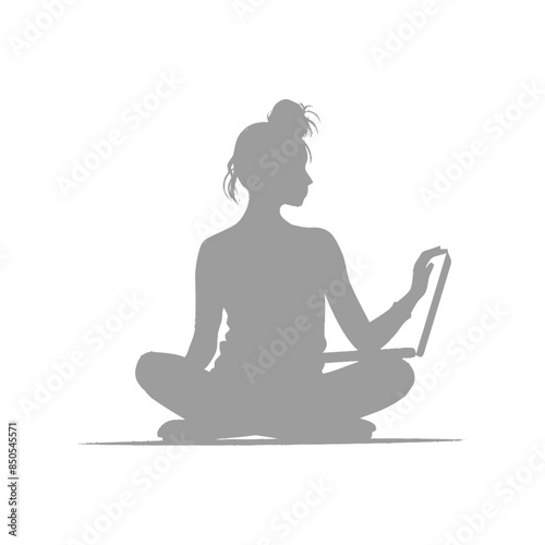 silhouette elderly woman playing on laptop while sitting cross legged