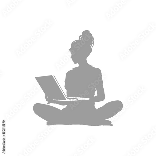 silhouette elderly woman playing on laptop while sitting cross legged