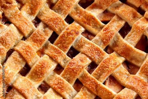 Close-up of golden apple pie. Thanksgiving traditional dessert.