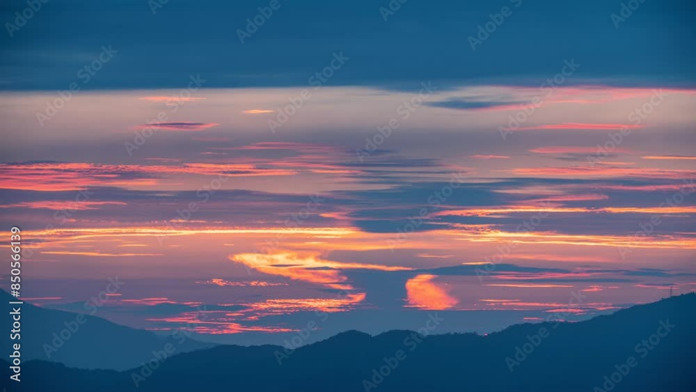 After sunset, the orange-red clouds are mysterious and strange. Landscape of the dusk sky at Dajianshan. Xizhi District, New Taipei, Taiwan. After sunset, the orange-red clouds are mysterious and strange. Landscape of the dusk sky at Dajianshan. Xizhi District, New Taipei, Taiwan.