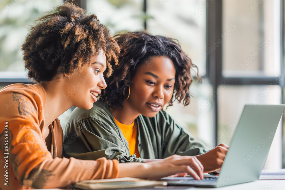A teacher and a student engaged in a virtual problem-solving activity. A teacher and a student engaged in a virtual problem-solving activity.
