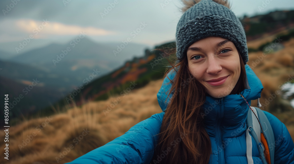young woman take a selfie on a moutaine hiking autum fall or winter young woman take a selfie on a moutaine hiking autum fall or winter