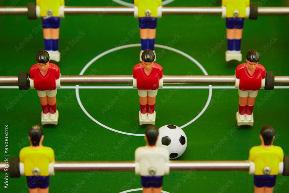 Board soccer game closeup, sports board foosball game Board soccer game closeup, sports board foosball game