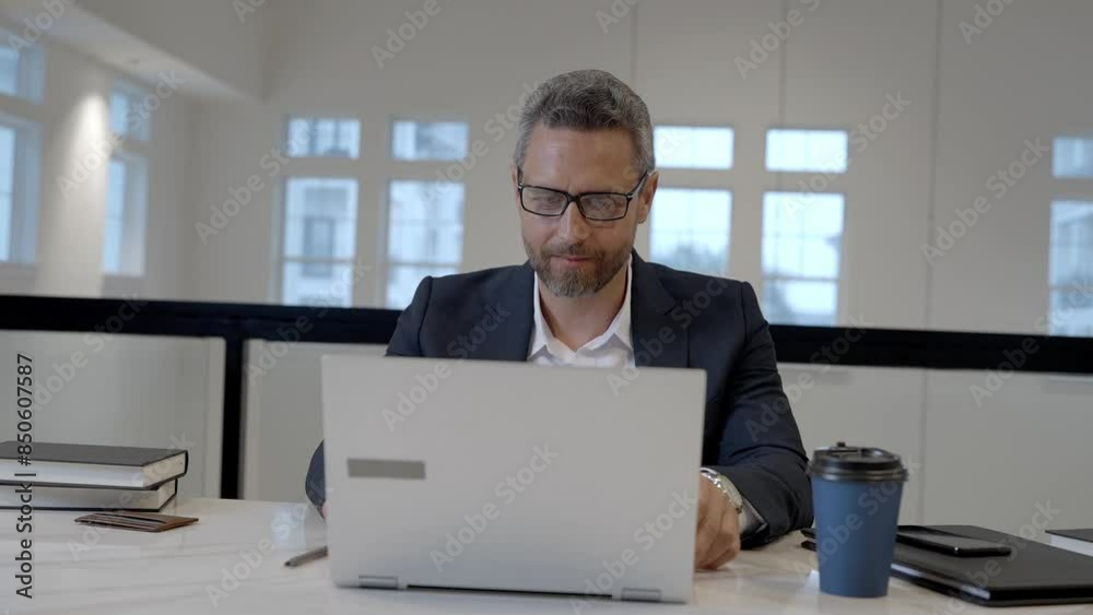 Middle aged businessman working with laptop in office. Hispanic business man using laptop. Millennial man using laptop at office workplace. Ceo manager office worker business people working at office. Middle aged businessman working with laptop in office. Hispanic business man using laptop. Millennial man using laptop at office workplace. Ceo manager office worker business people working at office.
