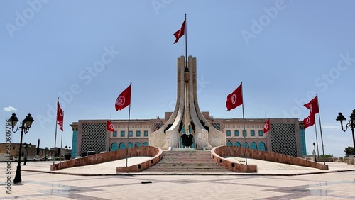 Tunis, Tunisia - 05-29-2024 -  Kasbah square the town hall (Hotel de Ville) Tunis, and the National Monument in the center